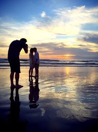 Scenic view of sea at sunset