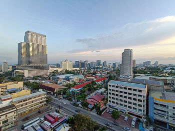 Cityscape against sky during sunset