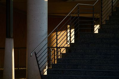 Low angle view of staircase in building at night