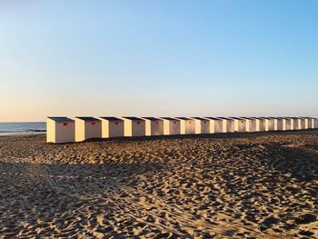 Scenic view of beach against clear sky