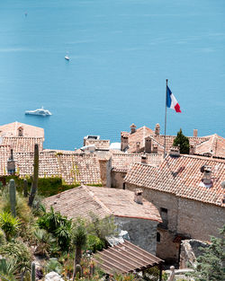 High angle view of historical village with french flag