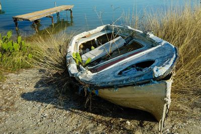 High angle view of abandoned boat moored on shore