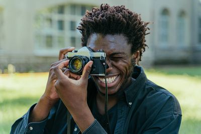 Portrait of man photographing