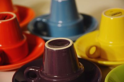 High angle view of multi colored cup and saucer