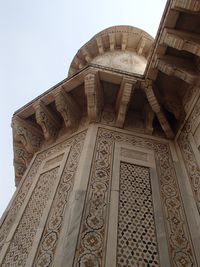 Low angle view of ornate building against clear sky