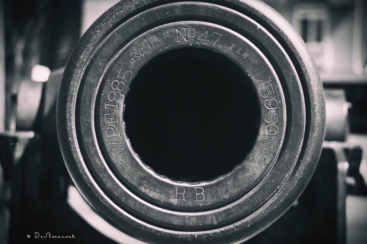 focus on foreground, close-up, circle, metal, selective focus, indoors, technology, camera - photographic equipment, no people, photography themes, lens - optical instrument, equipment, industry, black color, part of, metallic, old-fashioned, music, day