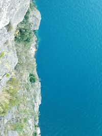 Scenic view of sea against mountain