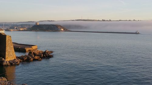 Scenic view of river against sky