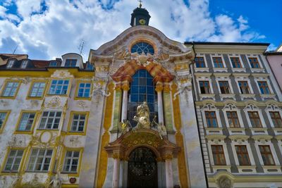 Low angle view of statue against building