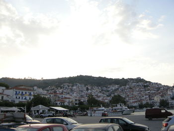 City buildings against cloudy sky