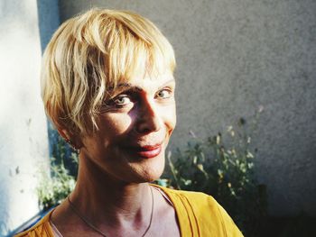 Portrait of smiling young woman outdoors