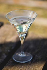 Close-up of champagne coupe on table