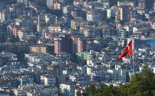 High angle view of turkish flag against cityscape