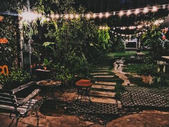 Table and chairs at night