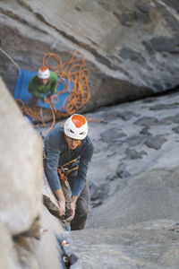 Rock climber crack climbing on the nose, el capitan in yosemite