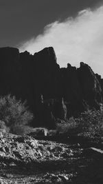 Scenic view of sea and rock formation against sky