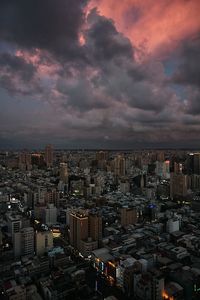 Aerial view of city at sunset