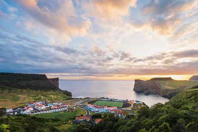 High angle view of sea against sky during sunset