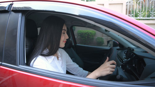 Woman sitting in car