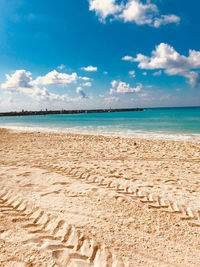 Scenic view of beach against sky