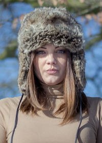 Close-up portrait of a smiling young woman