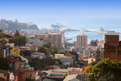 High angle view of buildings in city against sky