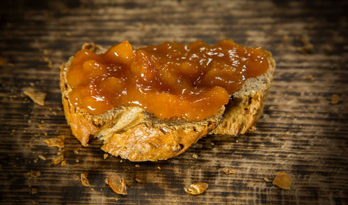 Close-up of orange on cutting board