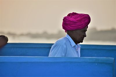 Close-up of man sitting in boat