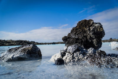 Scenic view of sea against blue sky
