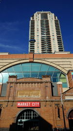 Low angle view of building against blue sky