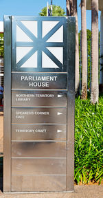 Close-up of text on wooden door