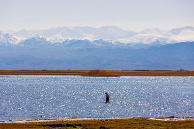 Scenic view of lake against mountains