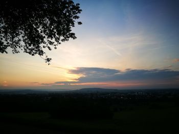 Scenic view of silhouette landscape against sky during sunset