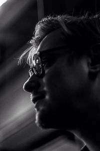 Close-up portrait of woman looking away