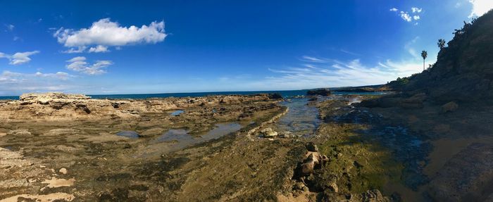 Panoramic view of beach against sky