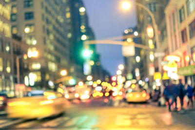 Traffic on city street at night