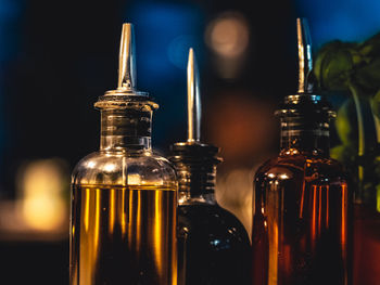 Close-up of wine bottles on table