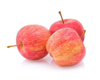 Close-up of apples against white background