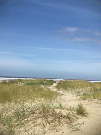 Scenic view of beach against sky