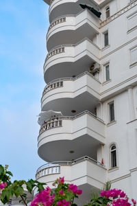 Modern ventilated facade with balconies. 