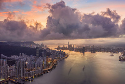 High angle view of buildings against sky during sunset