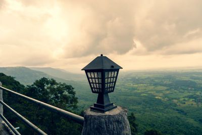 Gazebo on mountain against sky