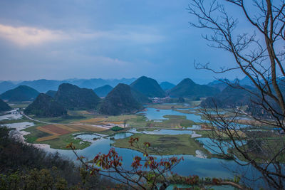 Scenic lanscape against sky at dusk