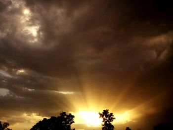 Sun shining through clouds