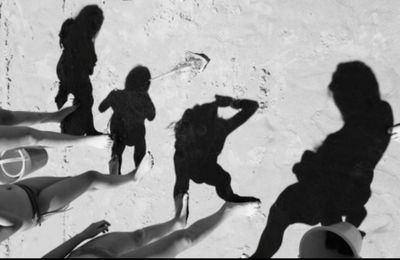 Shadow of people on the beach