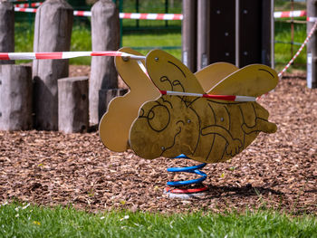 Close-up of stuffed toy on field