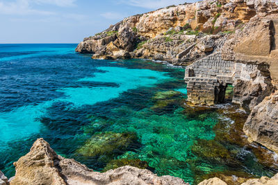 The tropical seewater on the shore of favignana, one of the aegadian islands in sicily