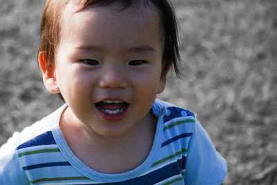 Close-up portrait of smiling boy