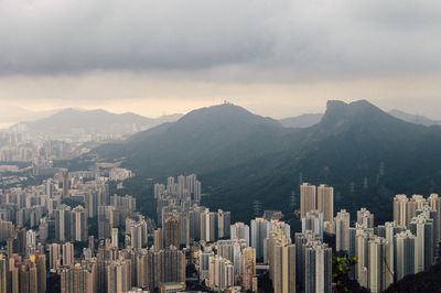 High angle shot of buildings against rocky mountains