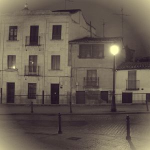 Buildings in city at night